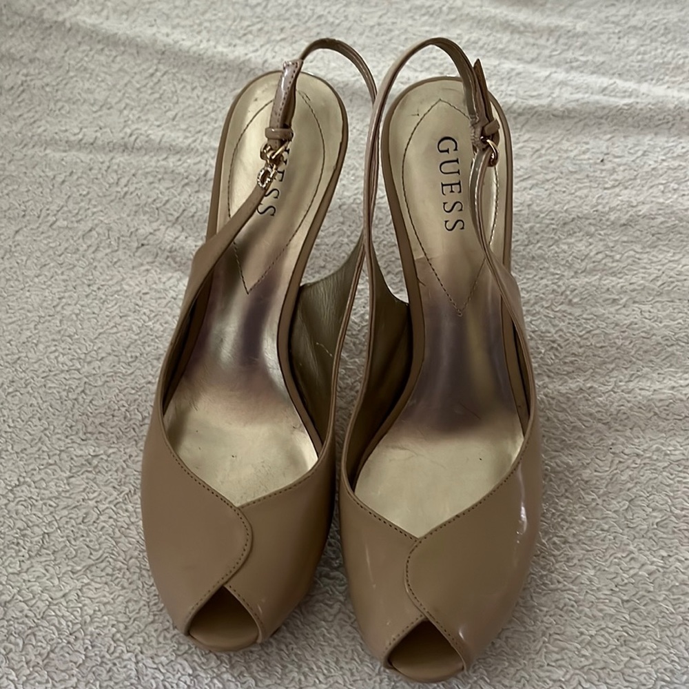 Guess patent leather platform peek toe sling backs.
